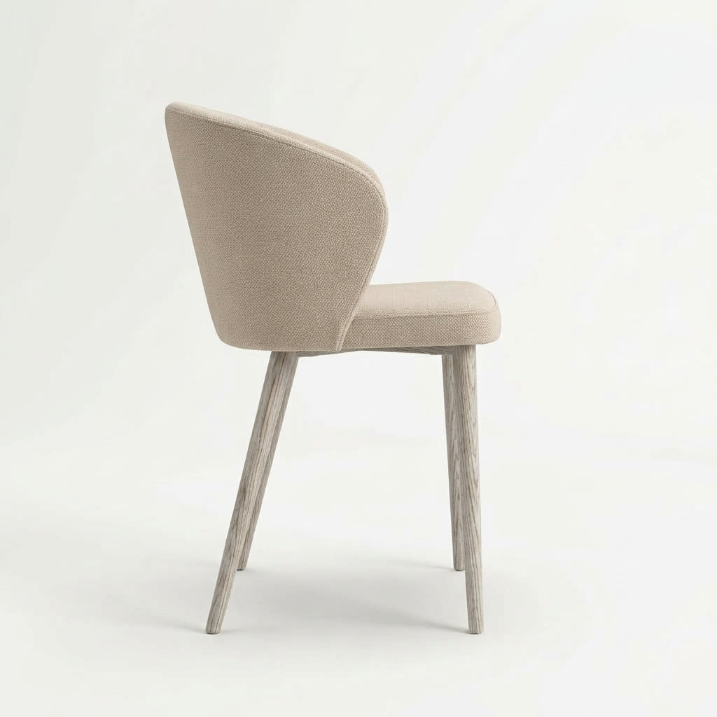 Indi Medium Bar Chair in beige boucle, three-quarter back view showing the curved shell