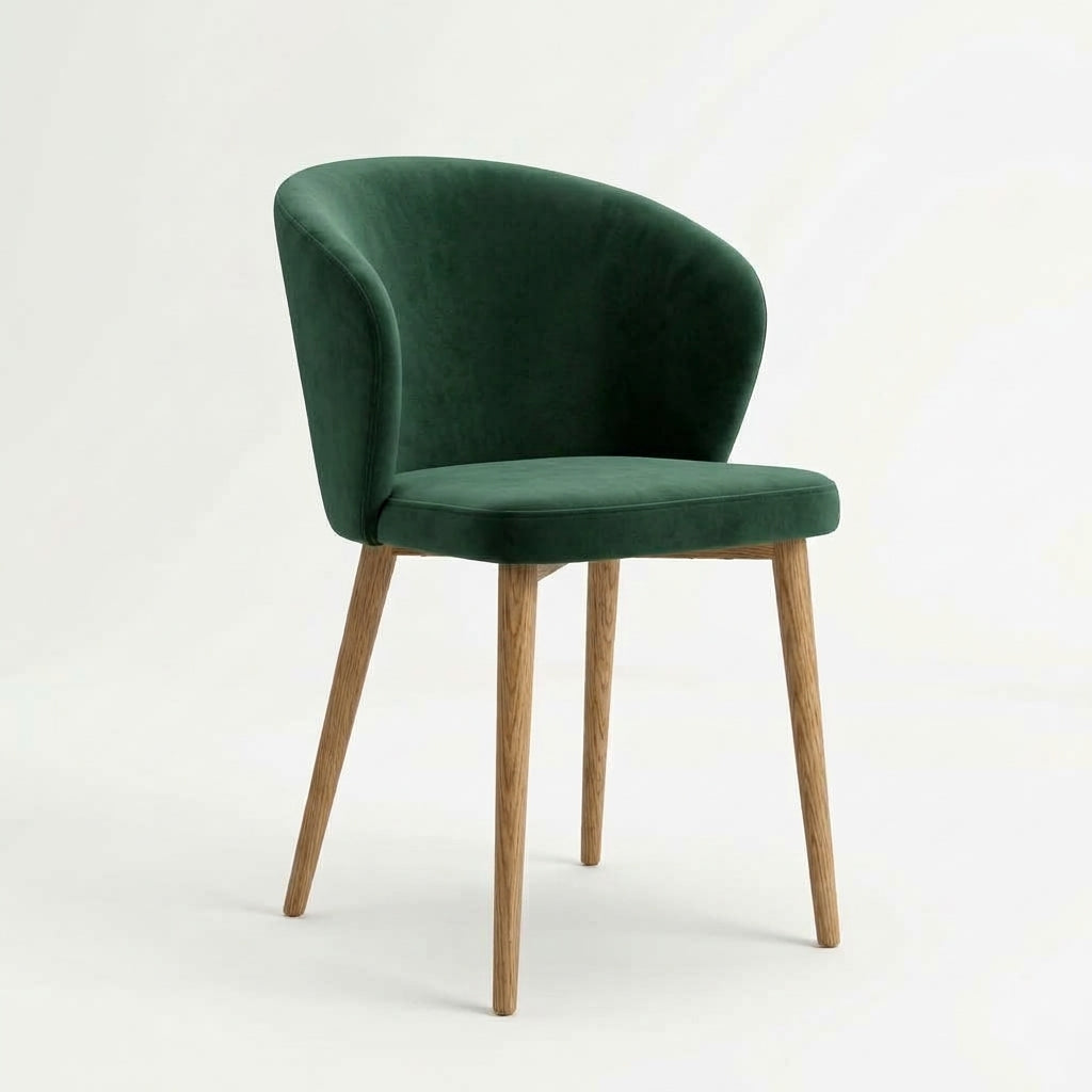 Indi Medium Bar Chair in emerald green velvet with oak legs, three-quarter front view